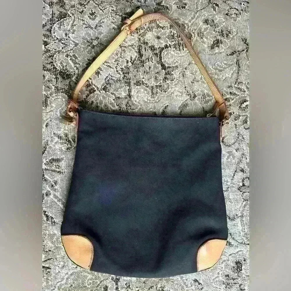 Bric’s classic minimalist style nylon leather shoulder bag. 11.5 T X 12.5 W